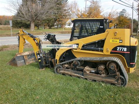 cat skid steer with backhoe|cat skid steer excavator attachment.